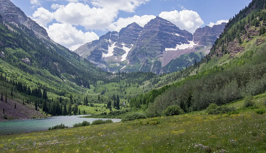 The Maroon Bells peaks reflected in a Colorado alpine lake